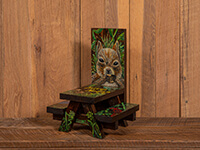 small picnic table with squirrel and cardinal painted on it