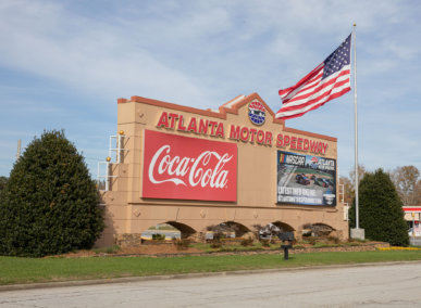 Atlanta Motor Speedway Sign at front entrance with flag