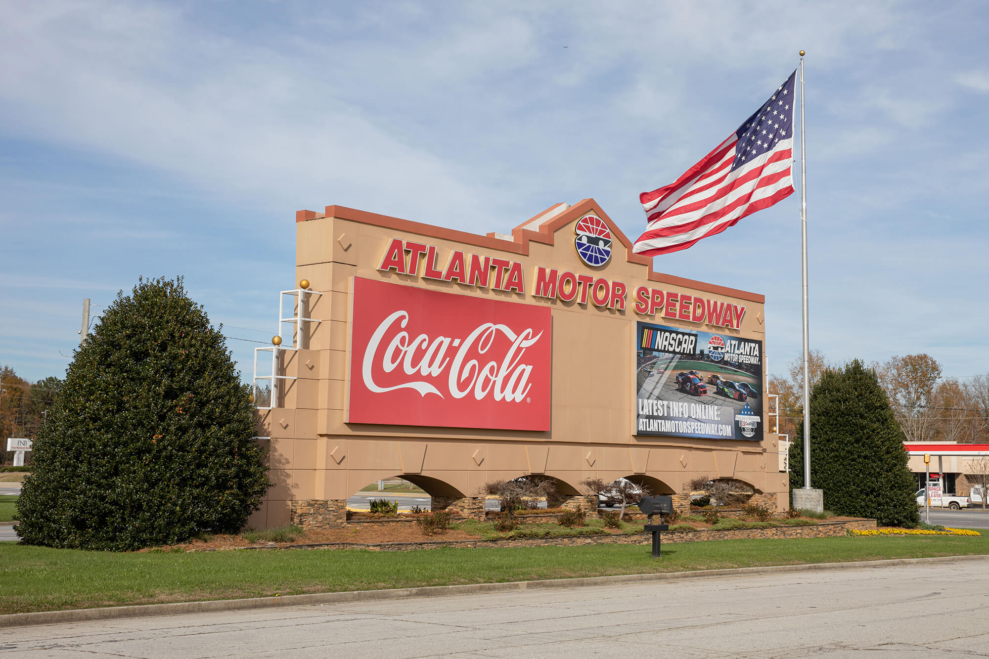 Atlanta Motor Speedway Sign at front entrance with flag