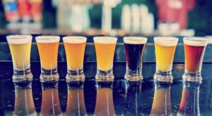 flight of beer tastings on bar