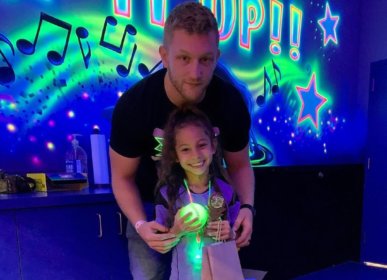 Father and Daughter at roller rink