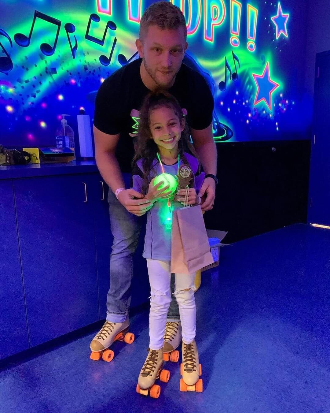 Father and Daughter at roller rink